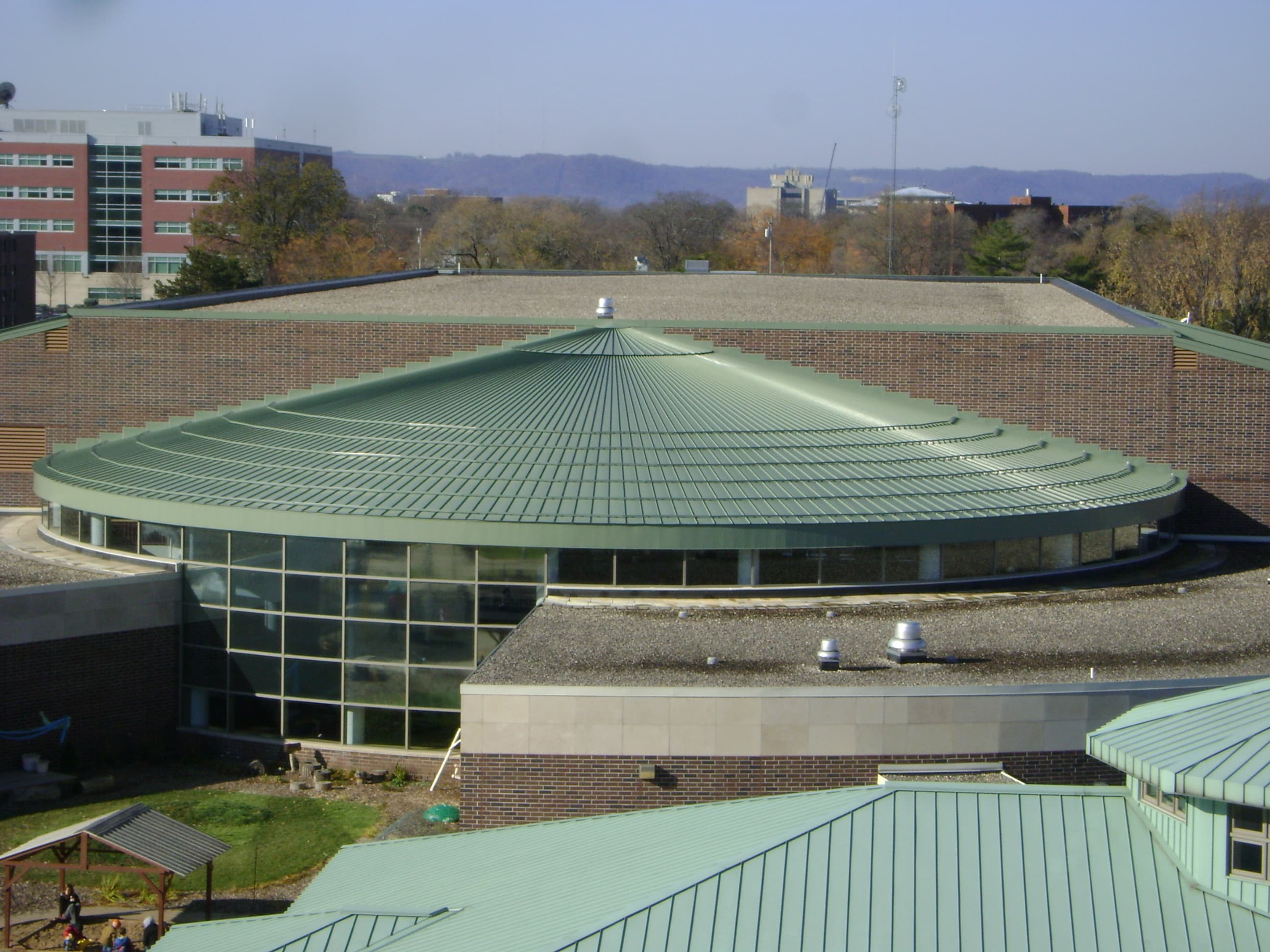 Standing seam metal roof on a curved commercial building